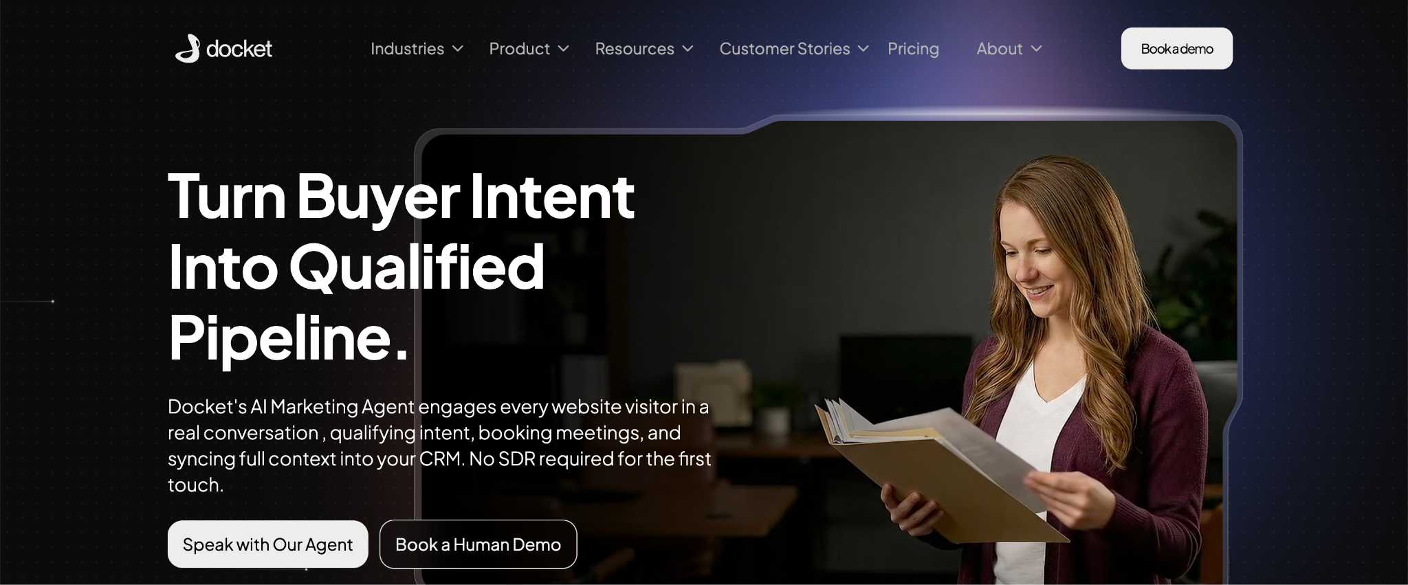 The Docket home page headed Turn Buyer Intent Into Qualified Pipeline, describing an AI Marketing Agent that qualifies intent, books meetings and syncs context into the CRM