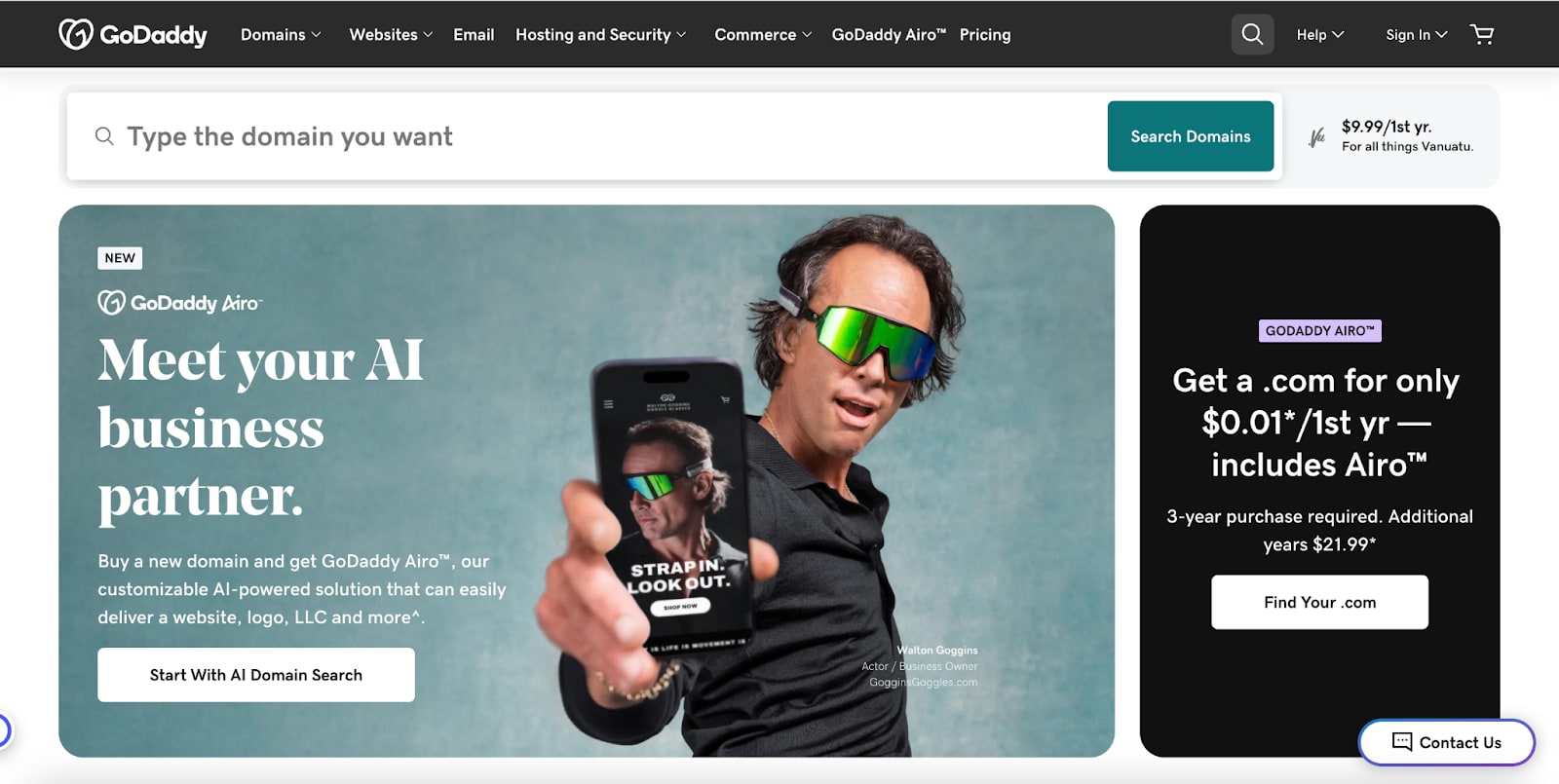 GoDaddy home page today, leading with "Meet your AI business partner" and an AI domain search button
